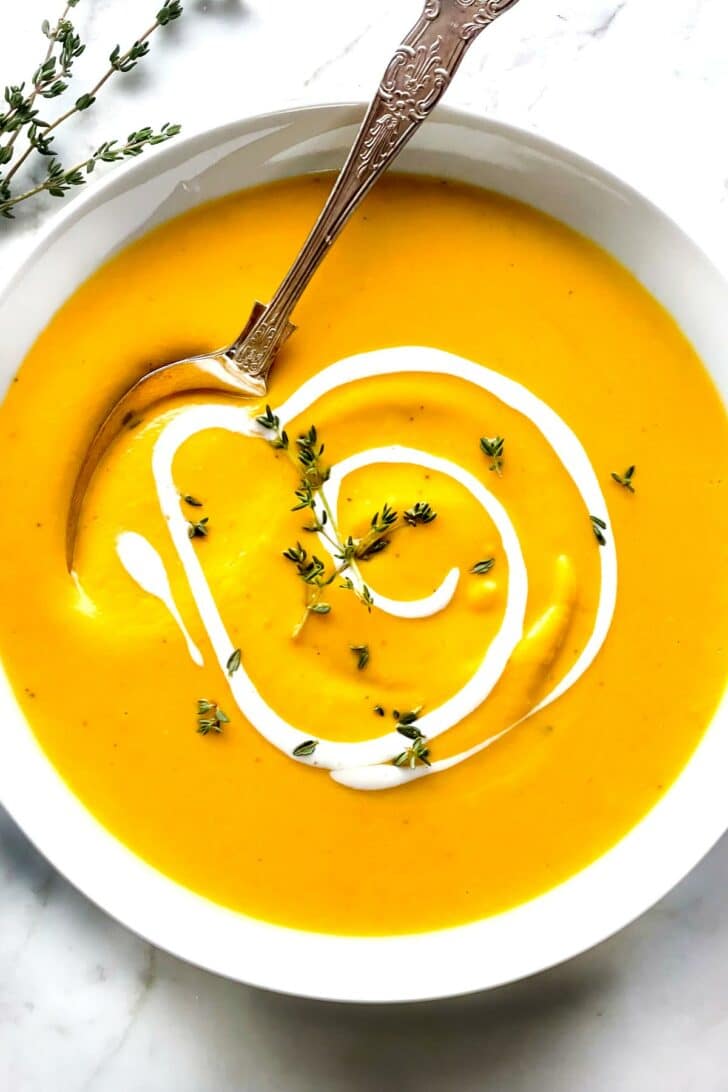 Roasted Butternut Squash Soup in bowl with spoon foodiecrush.com