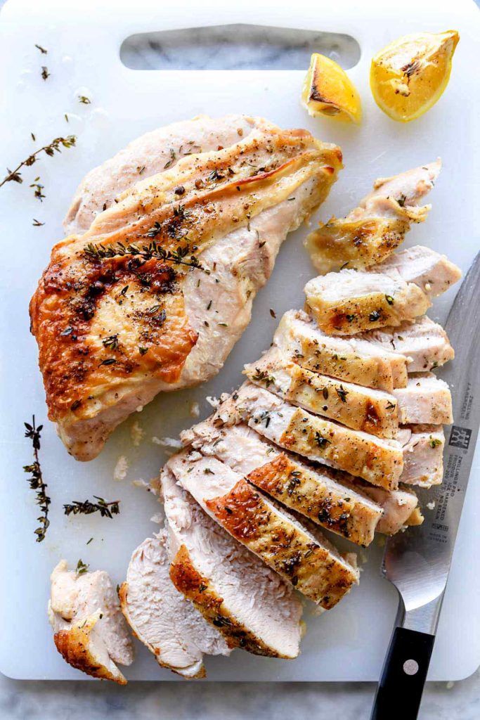 roast turkey breast on cutting board